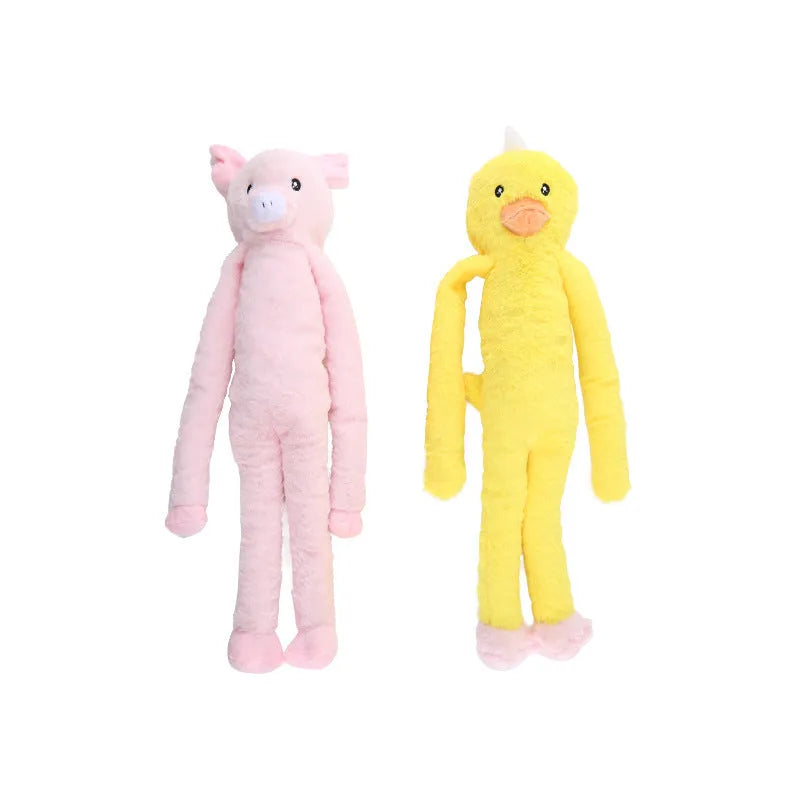 Large pink and yellow plush dog toy with squeaker and rattle paper for golden retrievers
