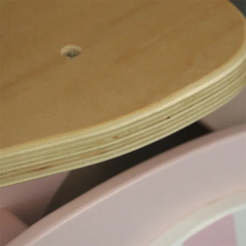 Pink wooden toddler balance scooter on a 10-inch wooden deck for children ages 1 to 6.