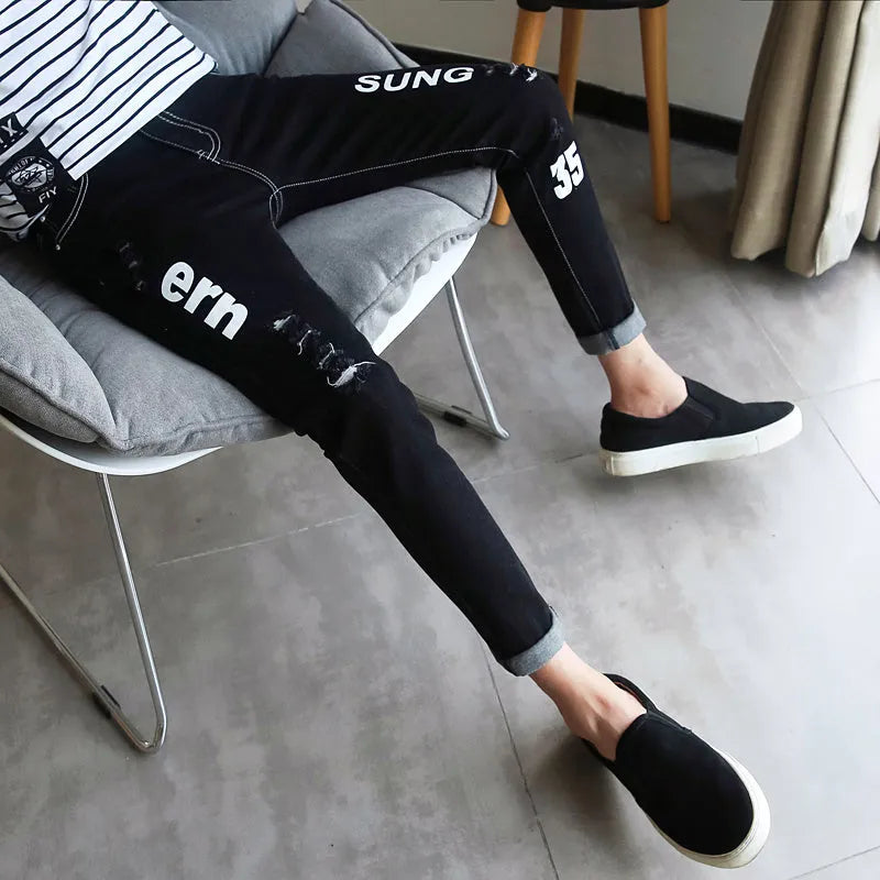 Men's autumn black ripped ankle jeans with micro elastic denim, youth-style tapered fit