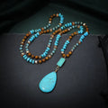 Turquoise blue big water drop pendant necklace with heart-shaped mixed gem design on ball bead chain