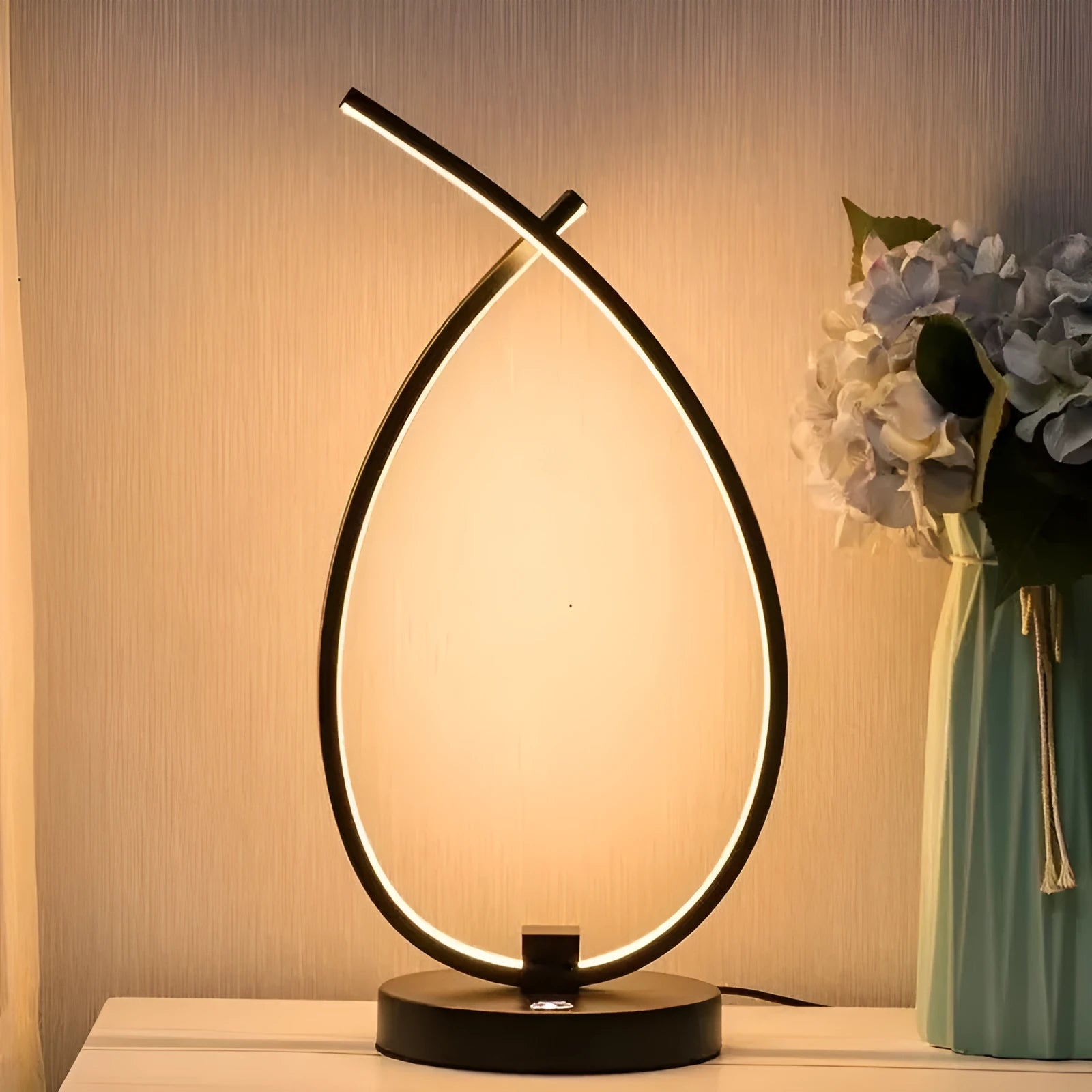 Water drop-shaped black bedside table lamp with USB charging cable