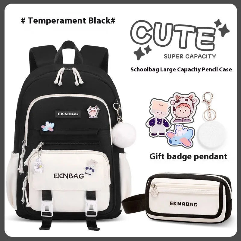 Pink waterproof Oxford cloth school backpack for girls with curved shoulder straps on a white background.