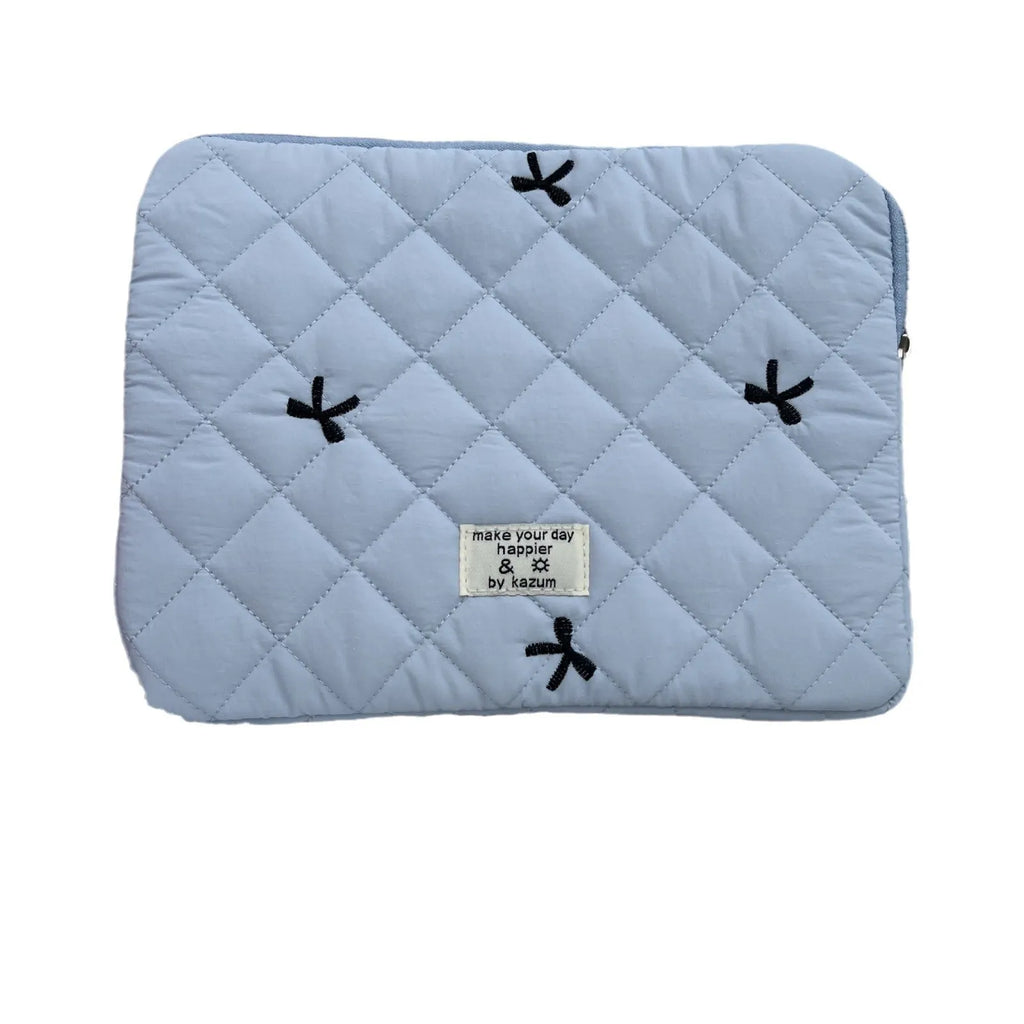 Nylon laptop storage bag with an embroidered rhombus bow in light pink colour.