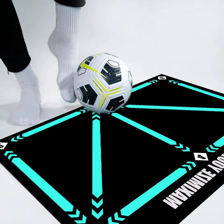 Black rectangular football training mat measuring 60 by 90 centimetres on a flat surface.