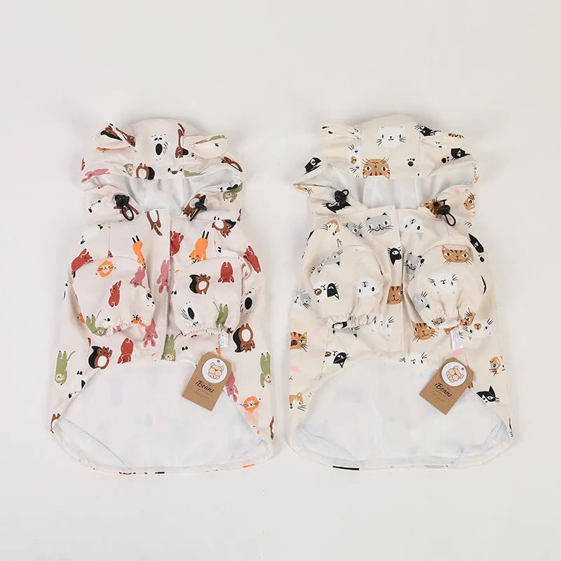 Beige dog raincoat with cartoon animal pattern waterproof PU material