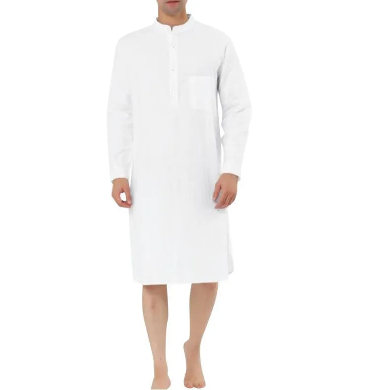 A man's long-sleeve cotton shirt robe in a light blue colour, showing a button front and chest pocket.