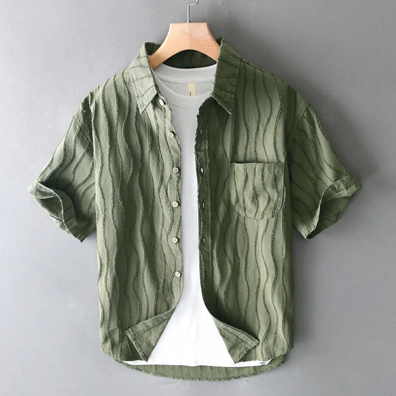 Men's loose-fitting pure cotton casual shirt in apricot colour with short sleeves.