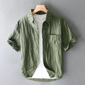 Men's loose-fitting pure cotton casual shirt in apricot colour with short sleeves.