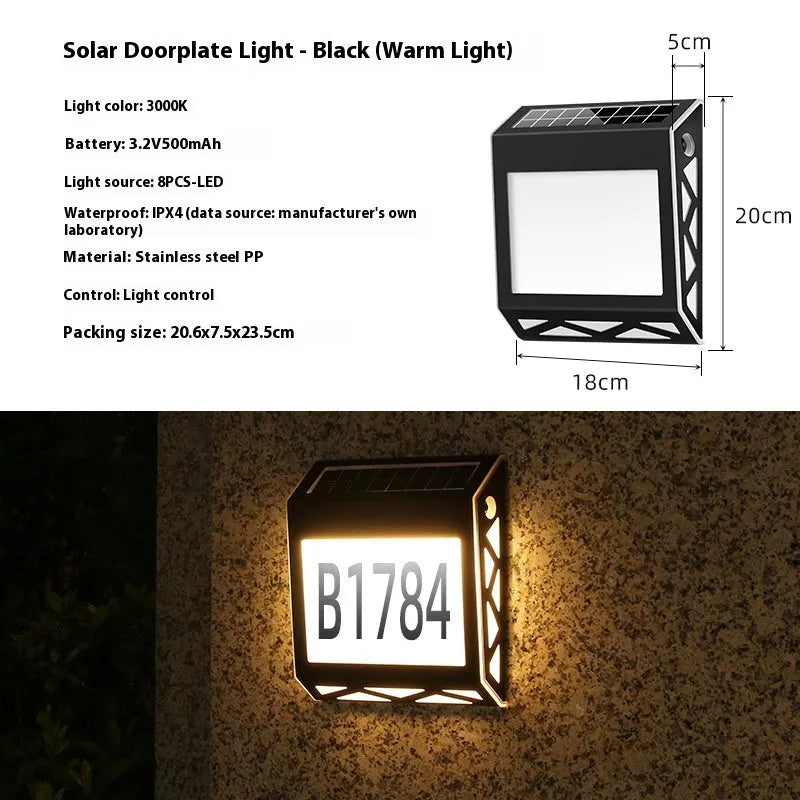 Solar powered doorplate light with LED indicator in black or silver finish, measuring 180x50x200mm