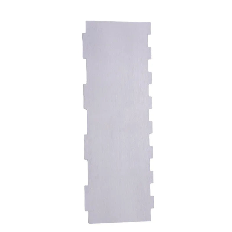 Stainless steel cake scraper with a polygon patterned blade for icing and filling work.