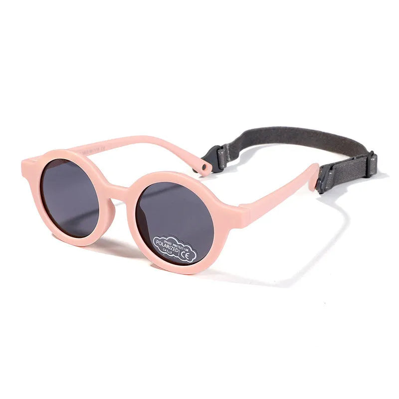 Children's silicone sunglasses with round frames for 0-3 year olds in multiple colour options showing UV400 and polarized protection