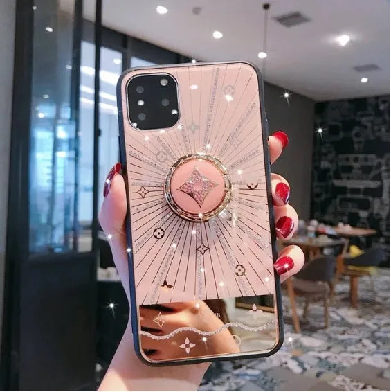 Luxury diamond and gold iPhone ring stand accessory in rose gold and white gold colours