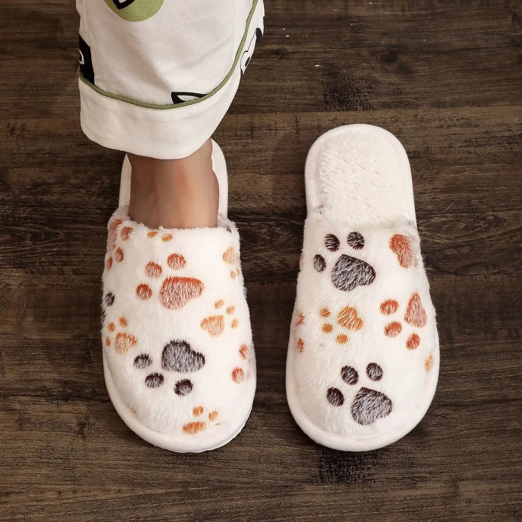 Women's cartoon print velvet cotton slippers in white with a toe holder design, shown on a plain background