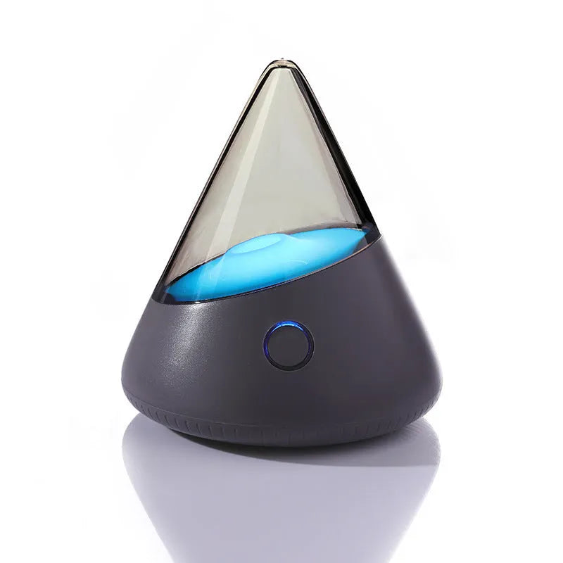 Colourful small geometric night lamp with built-in battery and Type-C charging cable on a wooden shelf