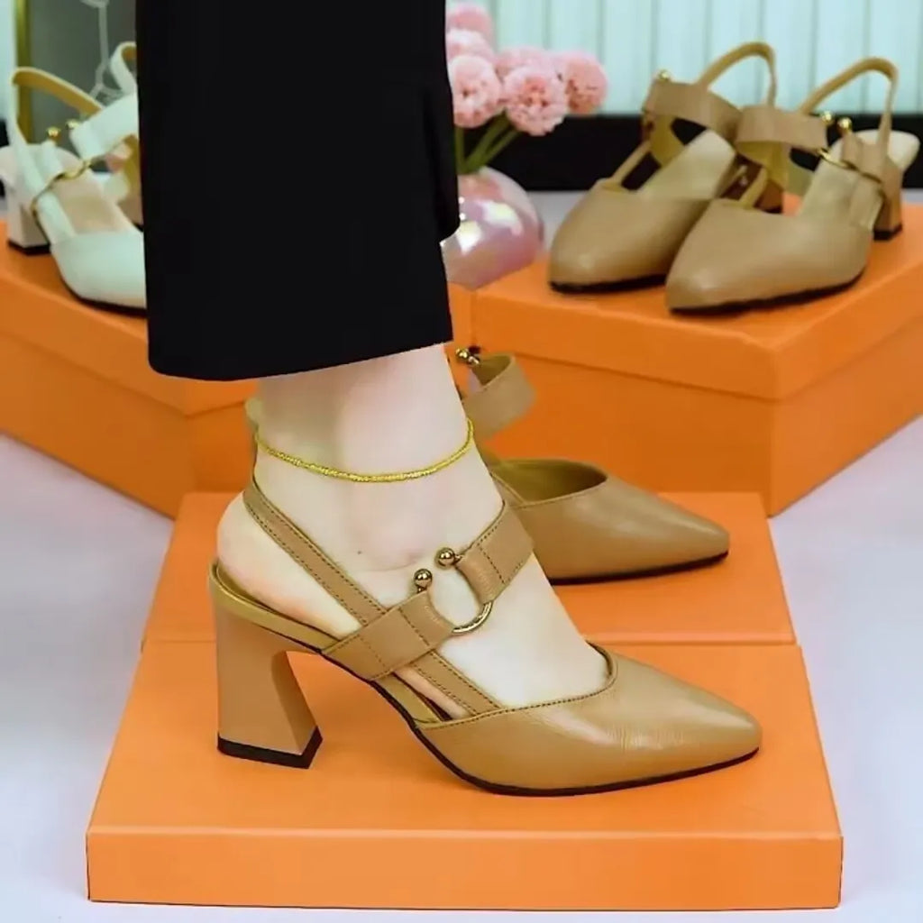 Women's apricot coloured pigskin leather sandals with a closed toe, backless design and a chunky heel.