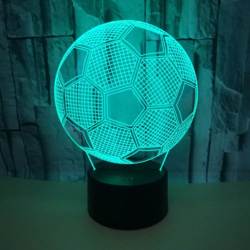 Football-shaped 3D night light with colour-changing acrylic panel on ABS base