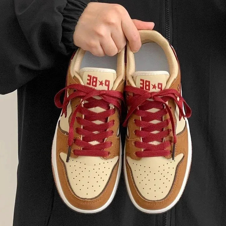 Brown women's platform sneakers with sequin details on PU leather upper and a white rubber sole.