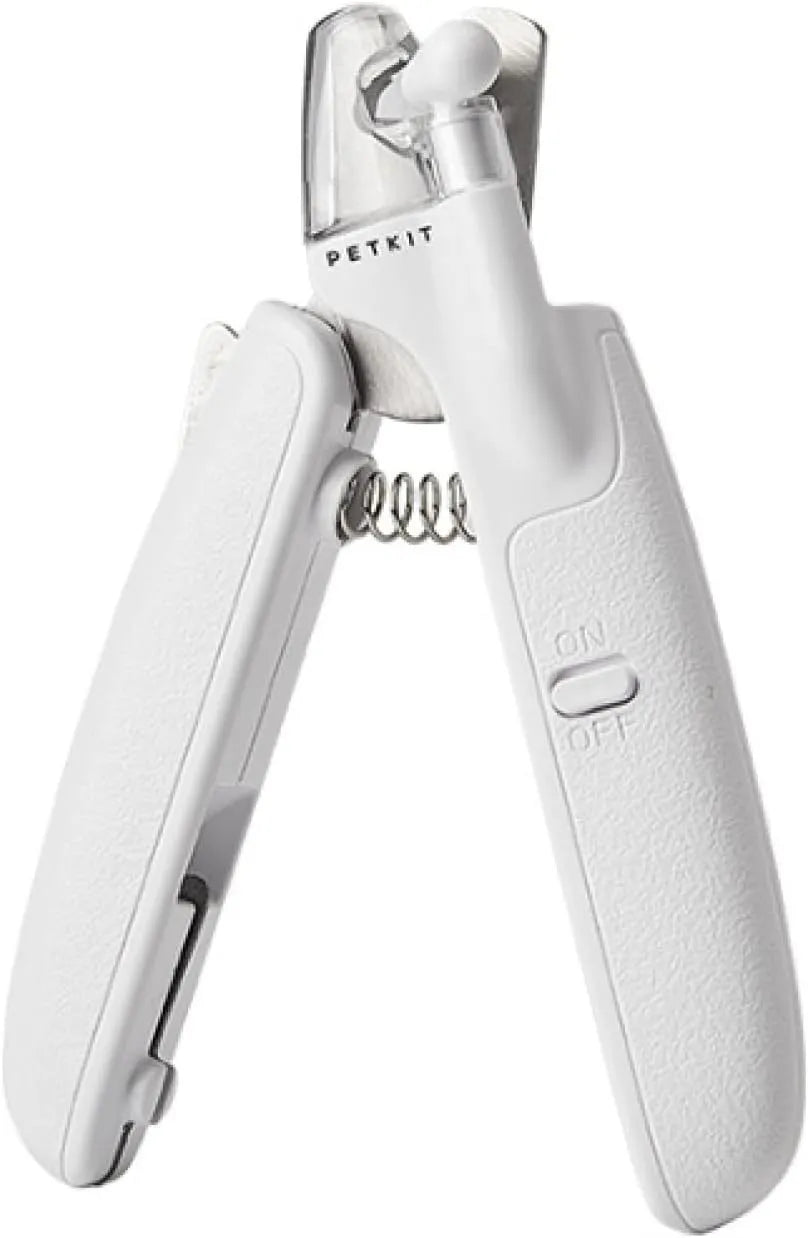 White pet nail clippers with LED light, transparent guard, and nail file for cats and dogs
