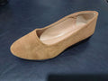 Women's pointed toe wedge pumps in suede with a low heel and shallow mouth opening.