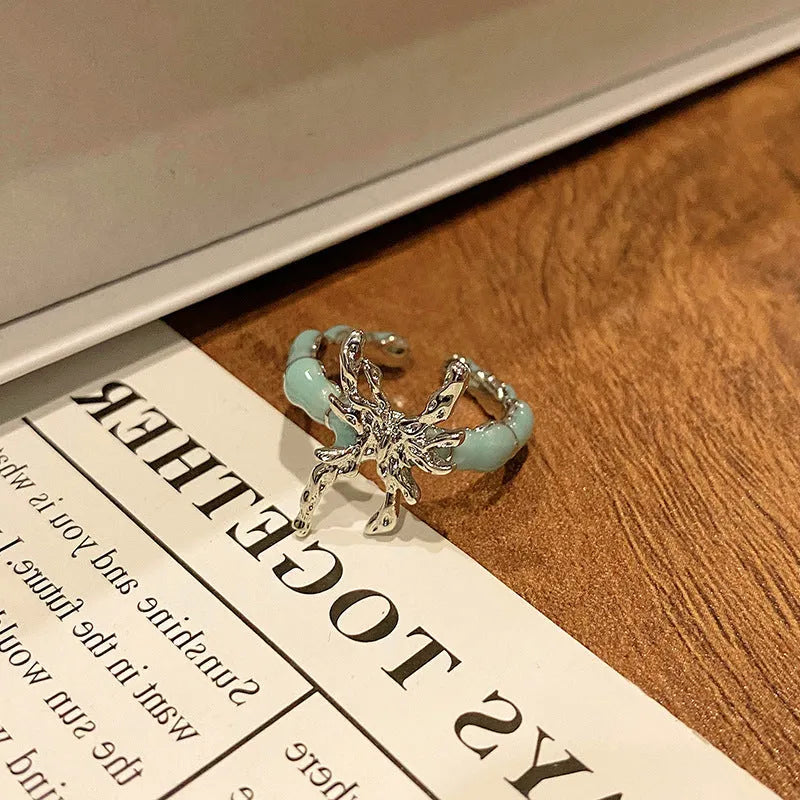 Chinese butterfly design women's ring in polished copper with oil drip texture
