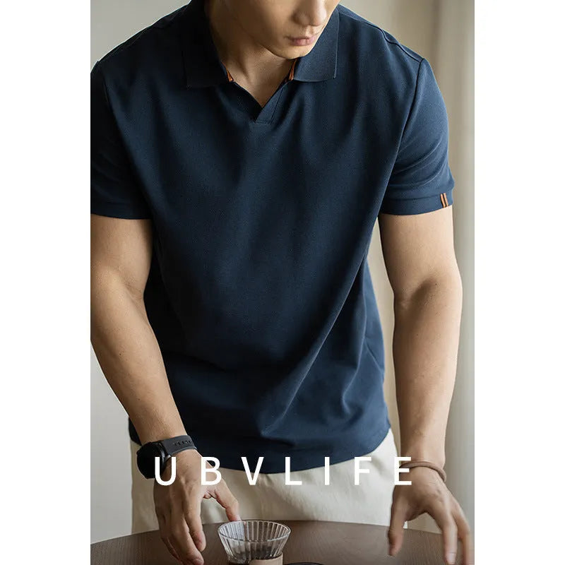 American-style short-sleeved polo shirt in blue, black, or white on a hanger.