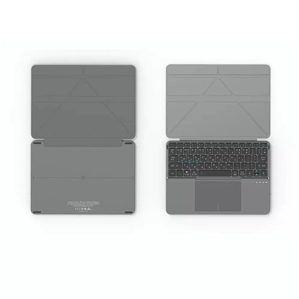 Grey folding Bluetooth keyboard with phone stand extended, showing compact folded size