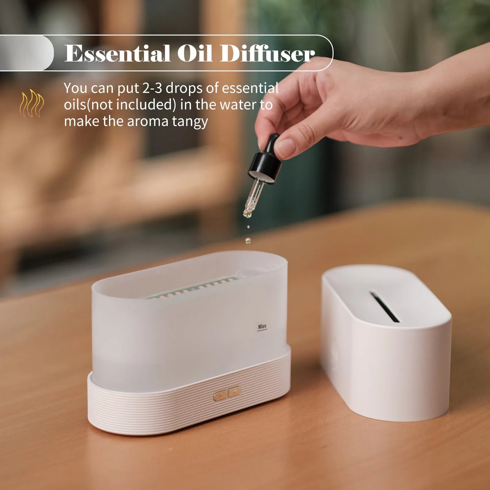 Square 180ml ultrasonic aroma diffuser with flame LED light in black, on a desk with visible mist