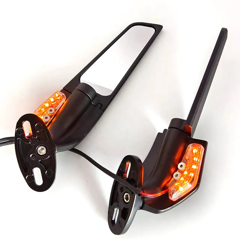 Pair of yellow motorcycle reflectors with convex glass lenses and aluminium alloy bodies for spoiler or mirror mounting.