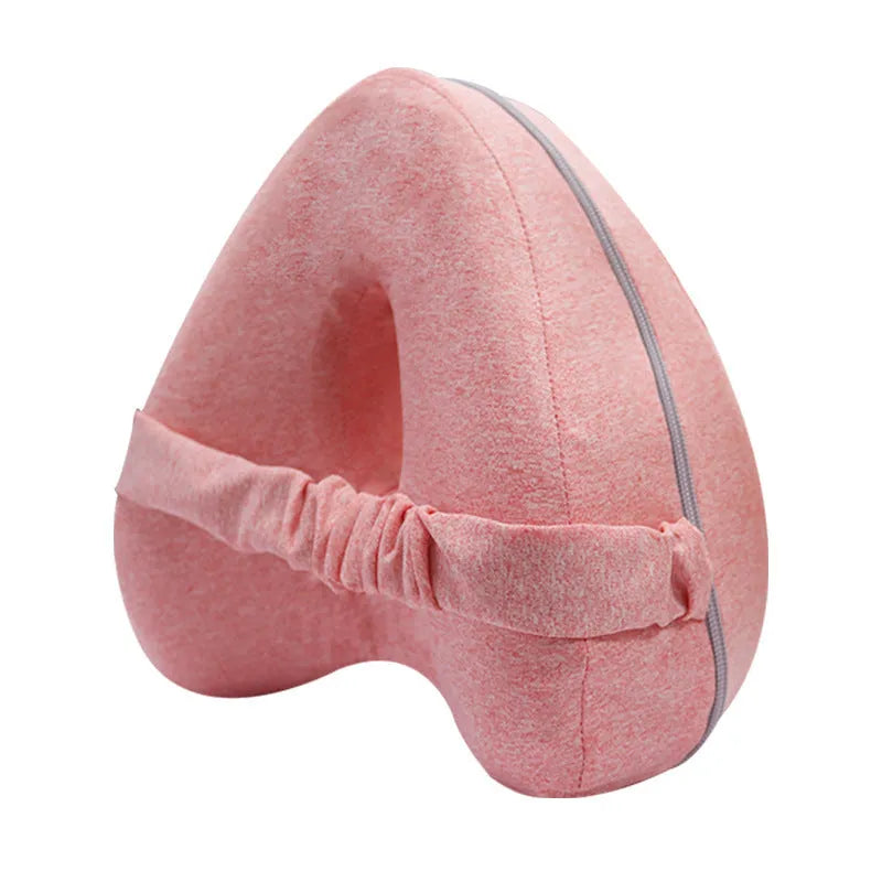 Heart-shaped dark blue memory foam leg pillow for adult knee or ankle support.
