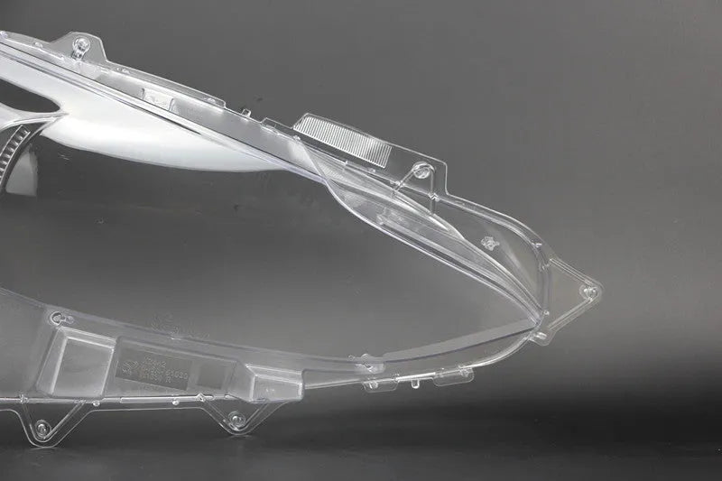 Mazda 3 Exela headlamp cover replacement part with snake glue adhesive for 14-16 or 17-19 models.