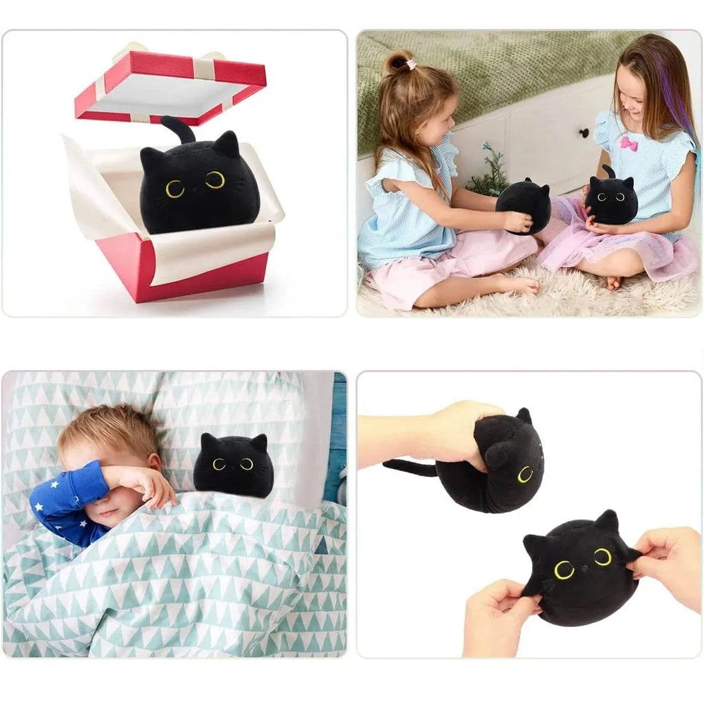Black fluffy cat plush toy with printed face, sitting upright as a soft cushion.