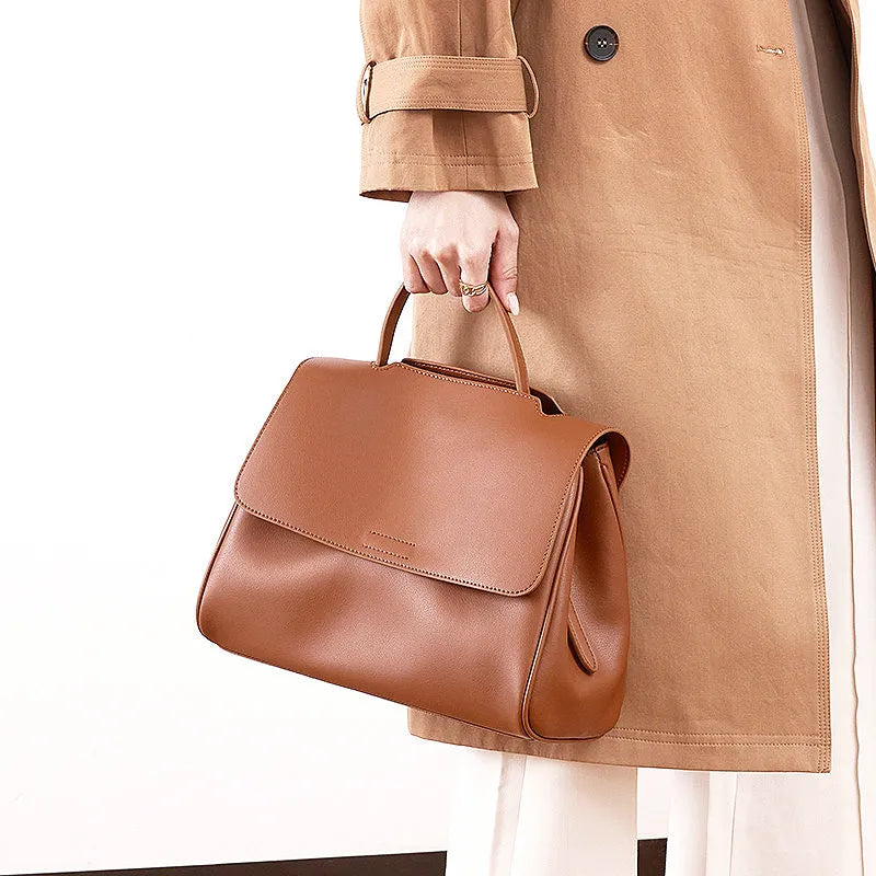 Genuine two-layer cowhide leather crossbody shoulder bag for women, horizontal square shape, solid colour with visible sewing thread detail