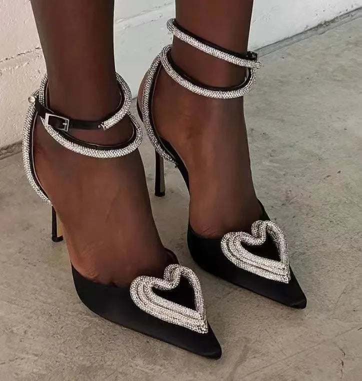 Women's pointed toe sandals with heart rhinestone on satin strap, rubber sole.