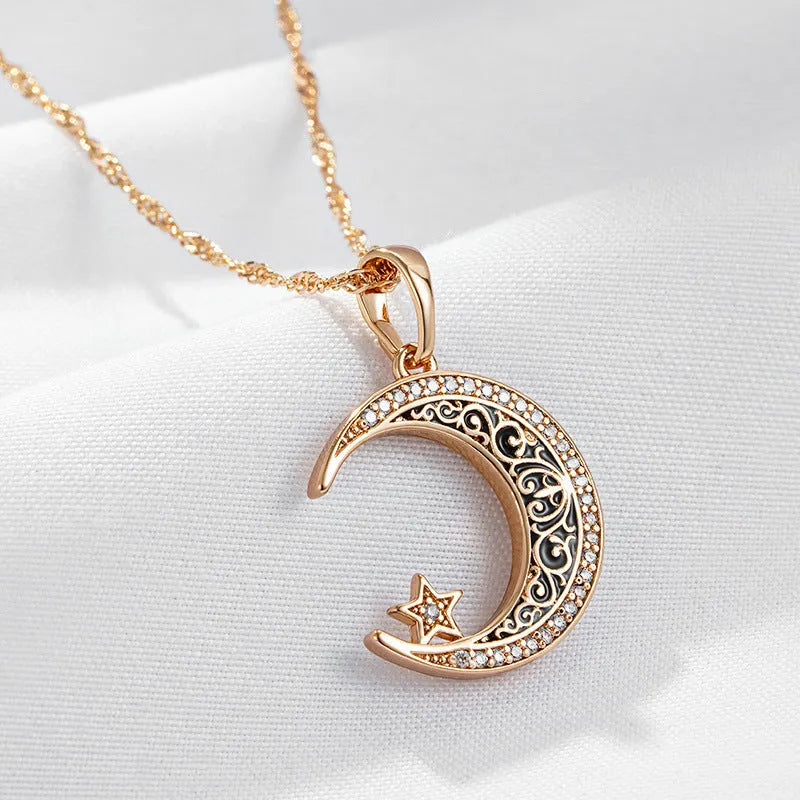 Rose gold star and moon necklace with zircon pendant on a water wave chain.