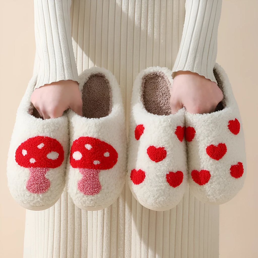 Plush women's slippers in Big Love colour with non-slip PVC sole and round toe.