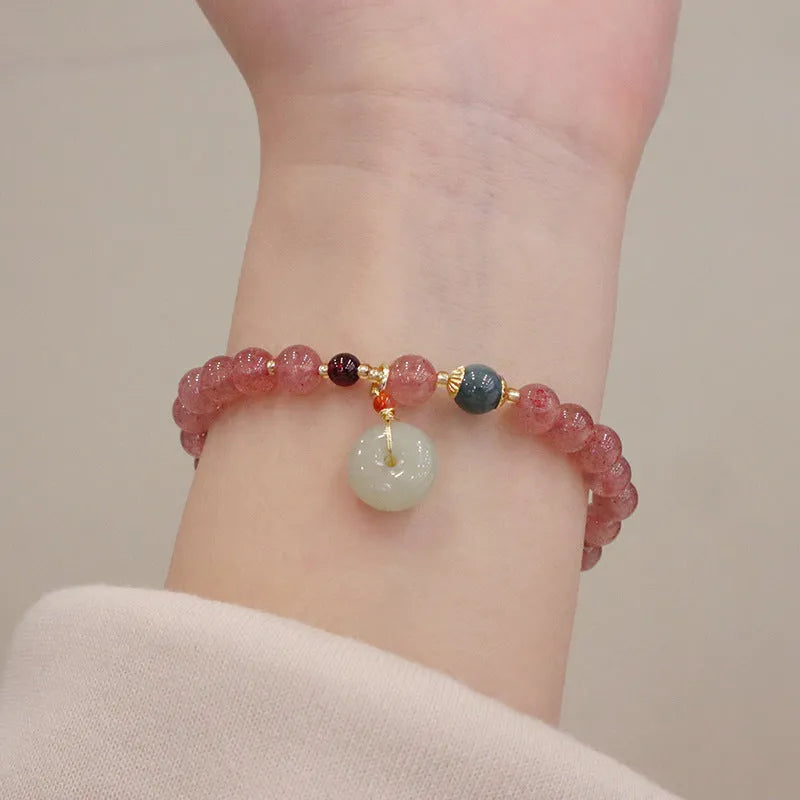 Strawberry quartz women's bracelet with geometric design, peace buckle charm and safety buckle closure