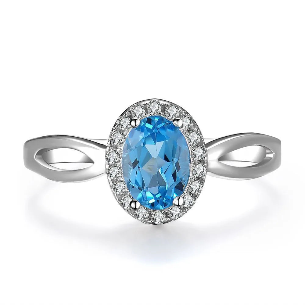 925 sterling silver jewellery set with blue topaz stones including geometric earrings, necklace, ring and pendant