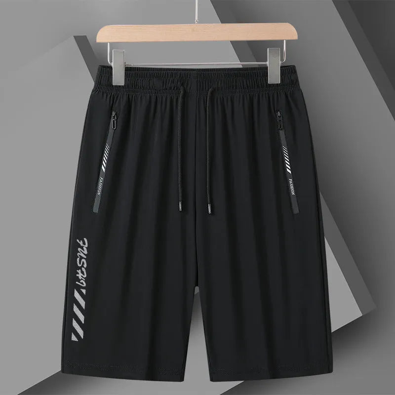 Men's quick-drying nylon sports shorts in black, loose fit with elastic waistband