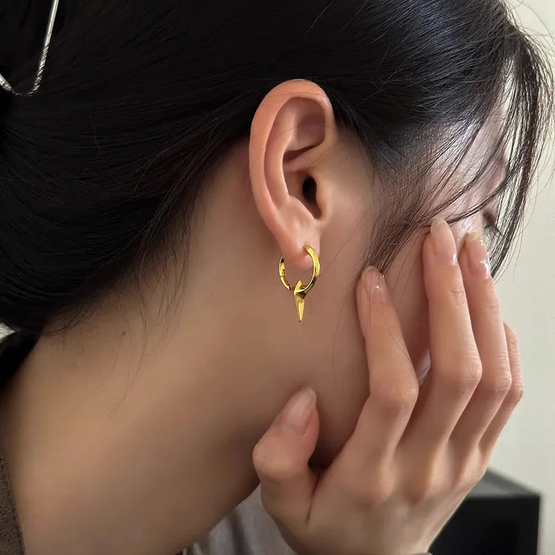 Geometric star shaped women's ear clips with electroplated copper white gold finish in platinum colour