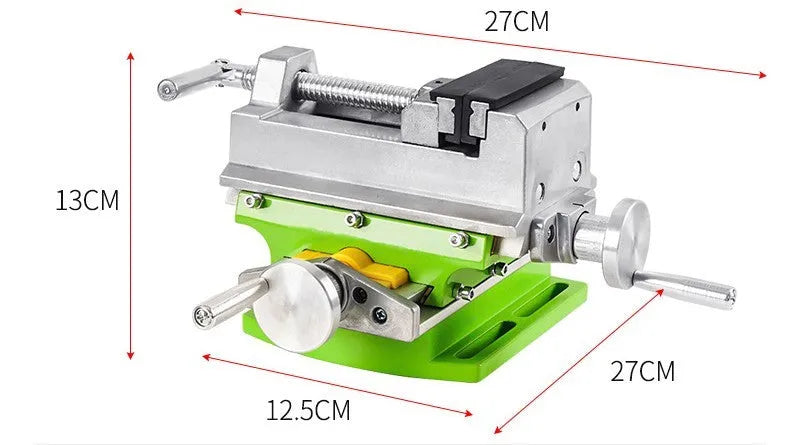 Mini bench drill milling machine with AC power supply and included bench pliers on workbench