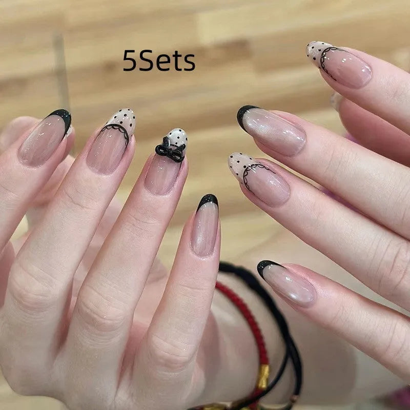 Assorted fake nail sets for girls in various colours and patterns.