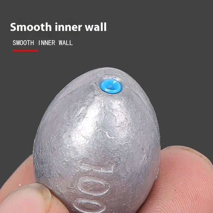 Sea fishing sinker with scale markings and plastic core olive lead in rugby shape