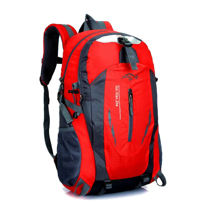 Large red Oxford cloth travel backpack with double straps, showing front compartment and buckle closure.