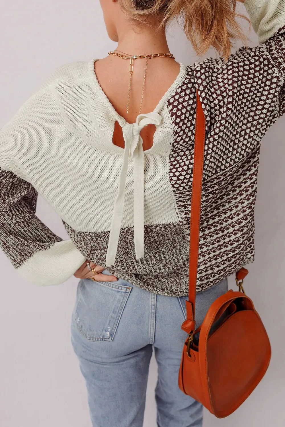 Dark khaki colour block women's loose sweater with drop shoulders and a back tie detail.