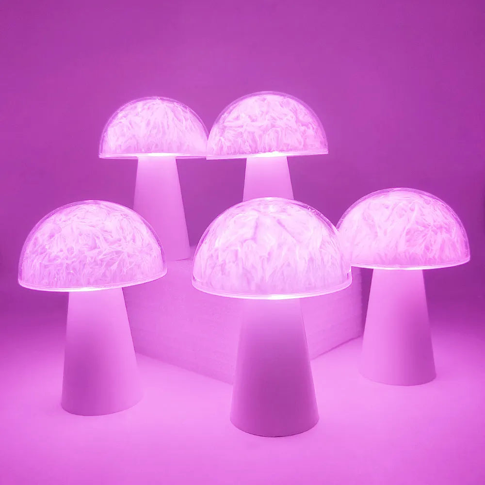 Mushroom-shaped remote control night light with RGB colour changing on wooden surface