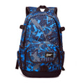 Classic large blue nylon backpack with multiple compartments shown from the front.