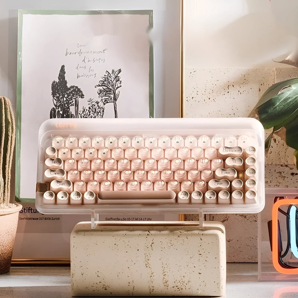 Liquid Foundation wireless 84-key mechanical keyboard, mouse, pick-up light, and Bluetooth calculator set on a desk.