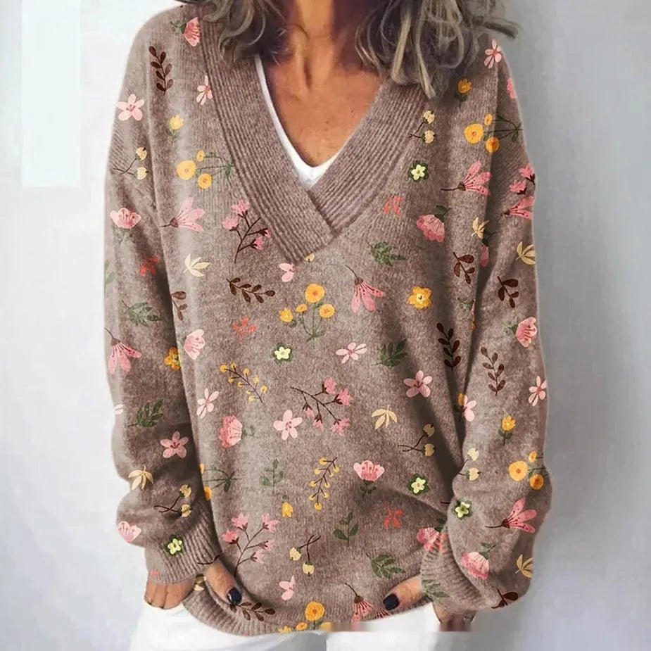 White women's V-neck long sleeve sweatshirt with a detailed 3D floral pattern print.