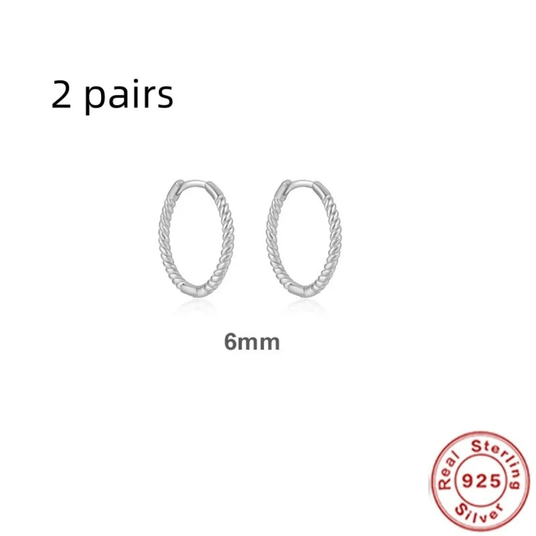 Sterling silver twisted hipster earrings in geometric round design with gold or platinum plating