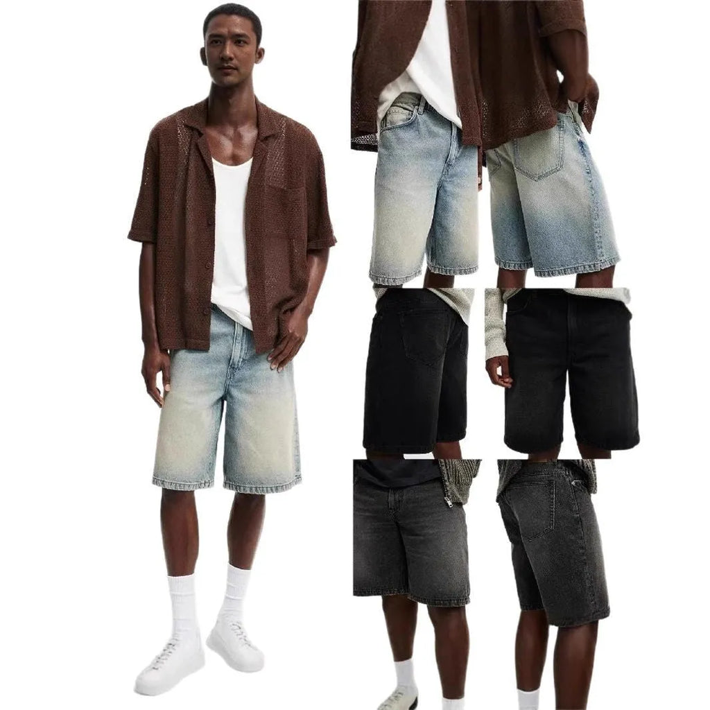 Man wearing loose fit light blue straight leg denim jeans, a streetwear summer style.
